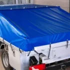 Yrityksen 4 kuva AIMOYHTIÖ OY / AIMOPEITE Tavaranpeitteiden, purjeiden ja muiden sovitettujen tekstiilituotteiden valmistus  Helsinki 18