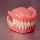 Yrityksen 2 kuva ERIKOISHAMMASTEKNIKKO KAI ILKKA OY Hammasproteesien, keinohampaiden ym. valmistus  Oulu 14